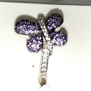 Purple sparkle with zirconia surrounding butterfly